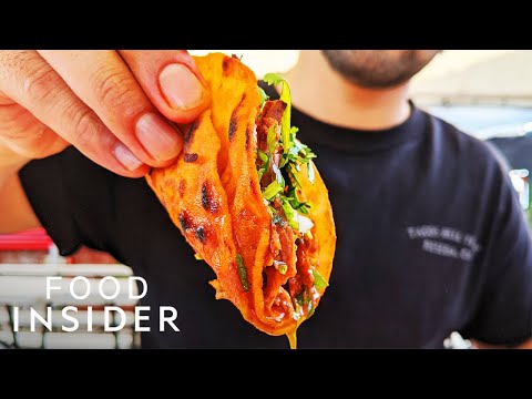 Why These Juicy Red Birria Tacos Are An LA Favorite | Line Around The Block Video