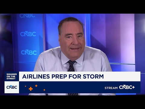 Airlines cancel hundreds of flights as massive winter storm sweeps across the U.S.