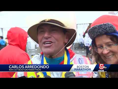 Final runners cross the Boston Marathon finish line