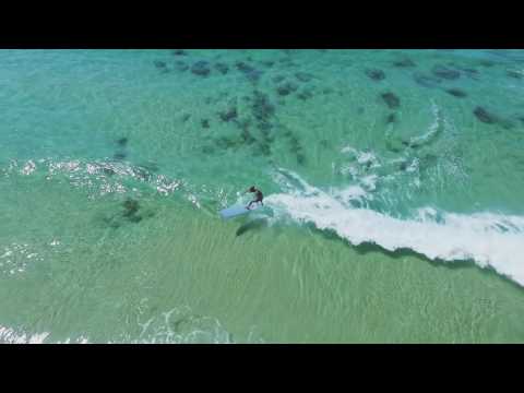 phantom 3 advanced shot, longboarding with a drone in small waves in bat yam israel.