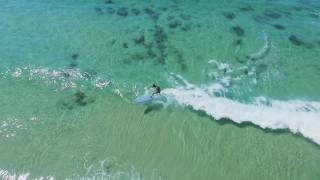phantom 3 advanced shot, longboarding with a drone in small waves in bat yam israel.