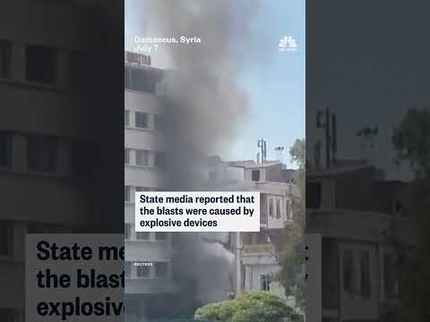 Explosions rock Damascus during Macron visit to Syria