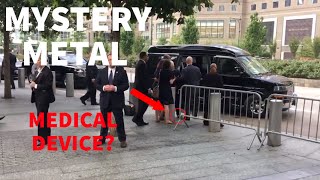 Mysterious piece of metal flings out of Hillary's pant leg