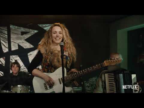 Closing trailer shot implying the final performance arc leading to Husavik