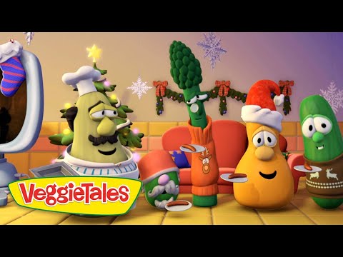 VeggieTales characters in Santa hats sharing plates at a holiday party, with a Christmas-themed backdrop and logo in the foreground.