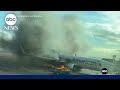 American Airlines flight catches fire at Denver airport