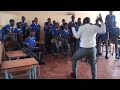 Pupils and teacher at Luanshya Boys singing Mbo by Chanda na Kay