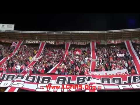 "//Señores lo dejo todo..// Rojo, mi buen amigo...// Independiente Santa Fe vs Deportivo La Coruña" Barra: La Guardia Albi Roja Sur • Club: Independiente Santa Fe