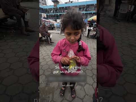 Palestinian girl in Gaza eats lemons with salt to cope with hunger
