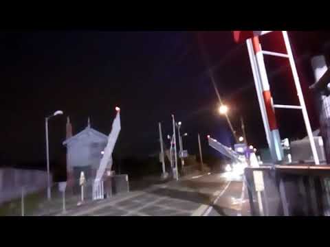 Level Crossing in Sutton, Dublin at night. 8600 class dart train.