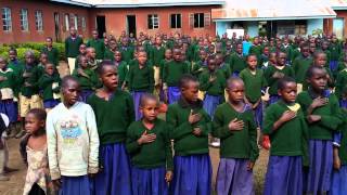 Tanzanian (Maasai) school children sing the National Anthem