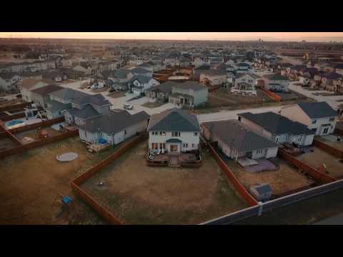 Beautiful Bridgwater Lakes two storey home for sale presented by Winnipeg realtor Scott Moore