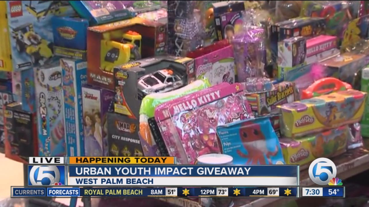 Urban Youth Impact giveaway in West Palm Beach helps parents with free holiday gifts for their child