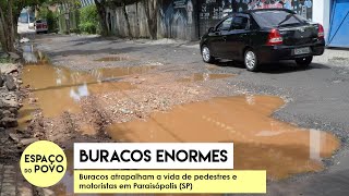 BURACOS ENORMES: buracos atrapalham a vida de pedestres e motoristas em Paraisópolis (SP)
