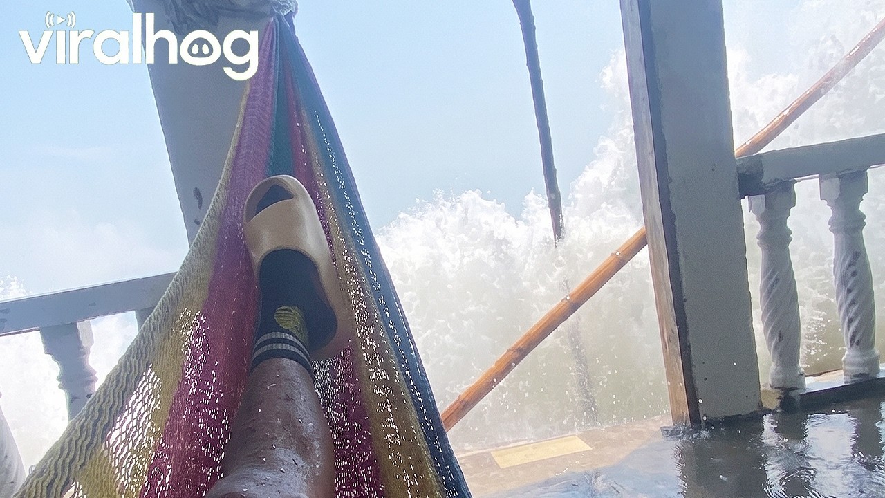 Big Wave Soaks Seashore Relaxation || ViralHog
