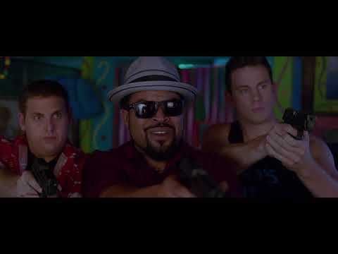 22 Jump Street official trailer frame with Schmidt and Jenko in spring-break shirts and sunglasses
