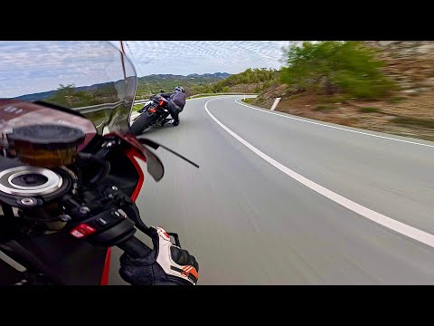 BMW S1000rr chasing a super fast Yamaha R1. Insane lean angles!!!