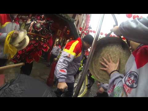 Lion Dancing at Chinese New Year with Dragon Sign UK in London's Chinatown