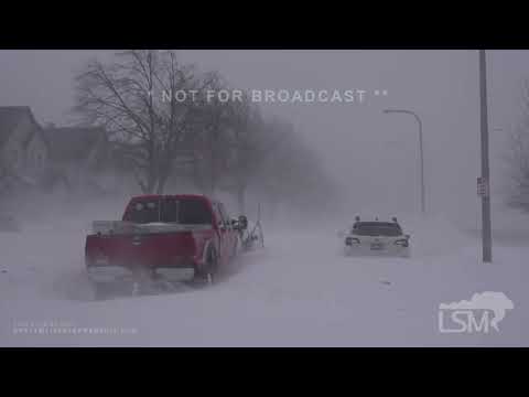 12-24-2022 Buffalo, NY Blizzard cars buried in snow litter downtown - wind damage