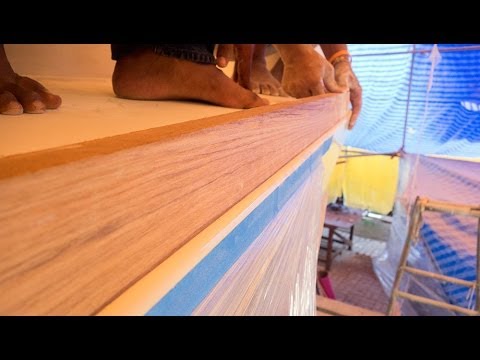 Esper Refit 20 - West System microlite; Osmosis prep; teak toe rail; 8mm laminate