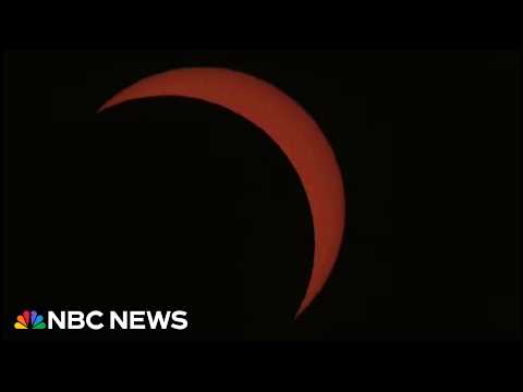 Crowds in London experience first total eclipse in 27 years