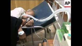 Dozens suffer breathing problems as sand chokes capital