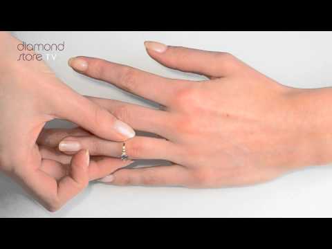 E4995 - Dazzling Tanzanite 0.28CT And Diamond 9K Gold Ring