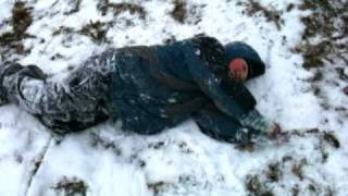 Father and son sledding on a 1978 Flexible Flyer