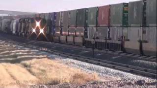 preview picture of video 'Eastbound stacker {w/ Kansas City Southern engine} meets westbound manifest (2011-12-18 part 6)'