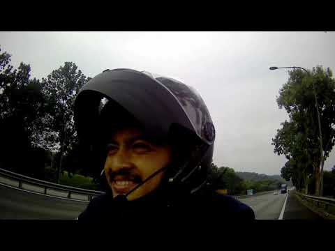 Ride into Singapore — Vespa sidecar red LX 150