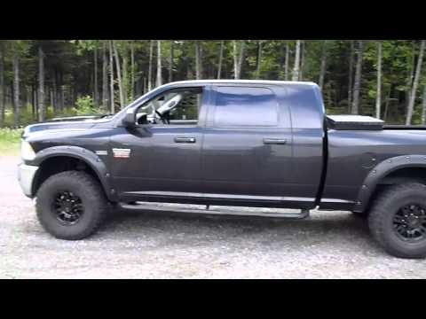 2010 dodge ram mega cab leveling kit 35'' tires mickey thompson sidebiter wheels.