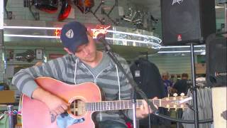 Nathan Laughlin Playing at Bost Harley Davidson for the NashvilleEar.com Songwriter Stage