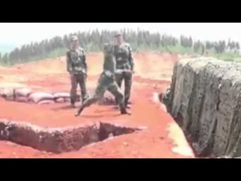 Chinese soldier fumbles live grenade