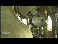 close up shot of hammer chiming big quarter bell and big ben