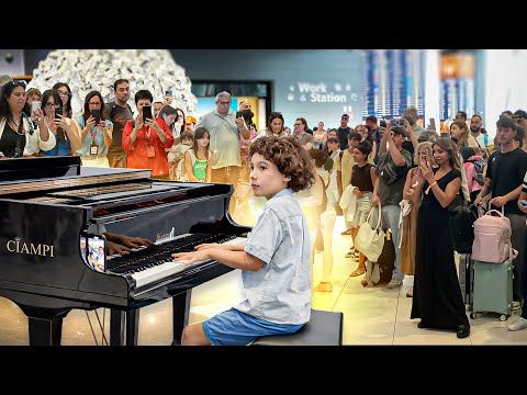 9 year old kid plays Vivaldi with us and shocks the entire airport … 🤯