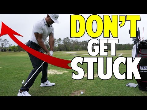Part of a video titled How To Stop Getting Stuck In The Golf Swing - YouTube