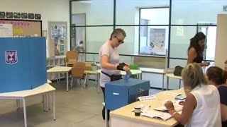 Israel votes with Netanyahu's political survival at stake