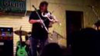 Jeff Cook plays the fiddle on Mountain Music