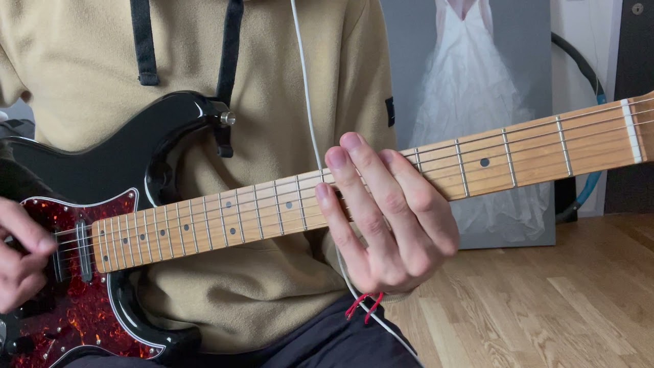 Roberto Barlocci playing the palm-muted intro riff from Muse's Psycho on electric guitar.