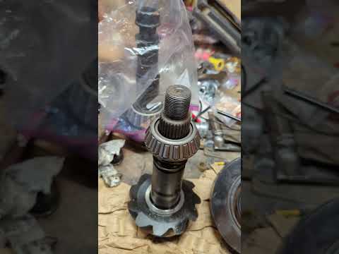 sliding old/used outer pinion bearing on after honing inside