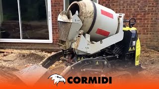 Hydrostatic C85 with Self-Loading Concrete Mixer