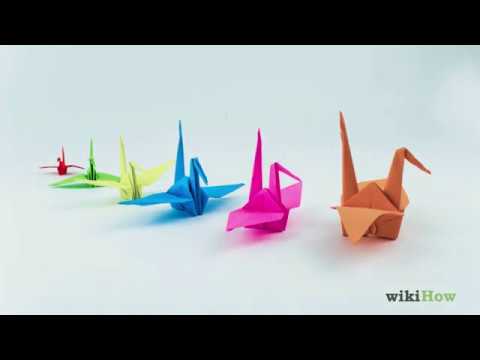 Einen Papier Kranich Falten