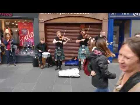 Dancing to Fiddlers in Royal Mile Edinburgh
