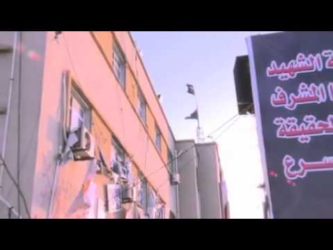 Libya - The flag of NATO buddies Al Qaeda flies over the courthouse of Benghazi