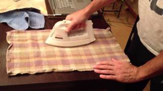 How to remove heat stains from wood furniture using an iron