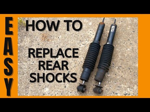 HOW TO REPLACE REAR SHOCK ABSORBERS EASY  MERCURY GRAND MARQUIS  CROWN VICTORIA LINCOLN TOWN CAR