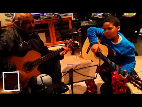9 year old Jude Cader playing guitar with Robbie