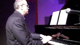 Roberto Magris on piano