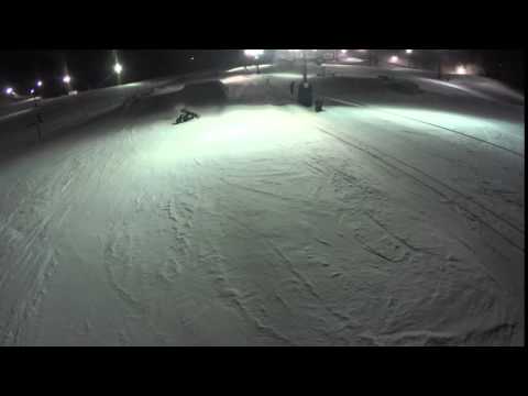 Snowboarder catches an edge and wipes out