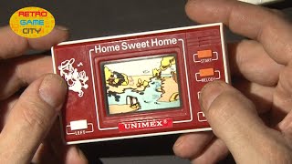 LCD Handheld Game from SUNWING / UNIMEX Home Sweet Home